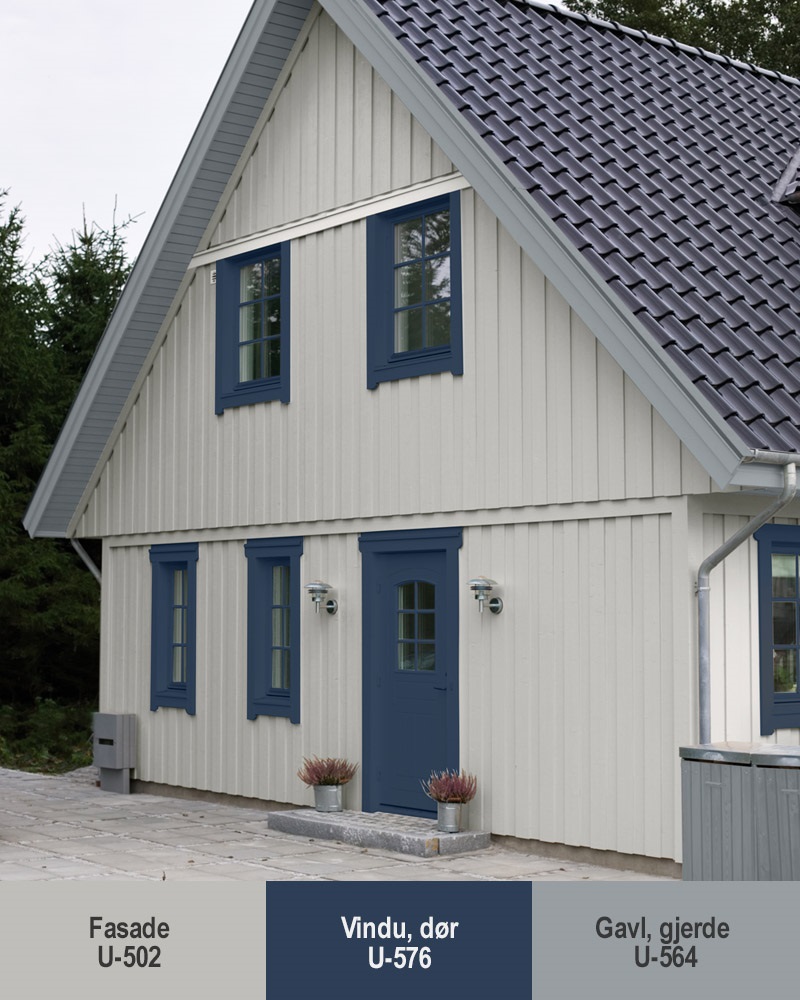 Når fasaden er hvit - eller nesten hvit - kan du slippe unna med å velge en tone til vinduer og dører som er litt markant. Det gir hygge og originalitet. Her har vinduene en markant farge mot den lyse fasaden